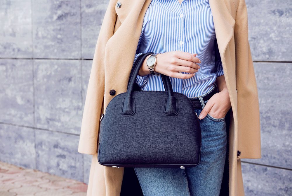 Accessoires Michael Kors Frau mit Handtasche
