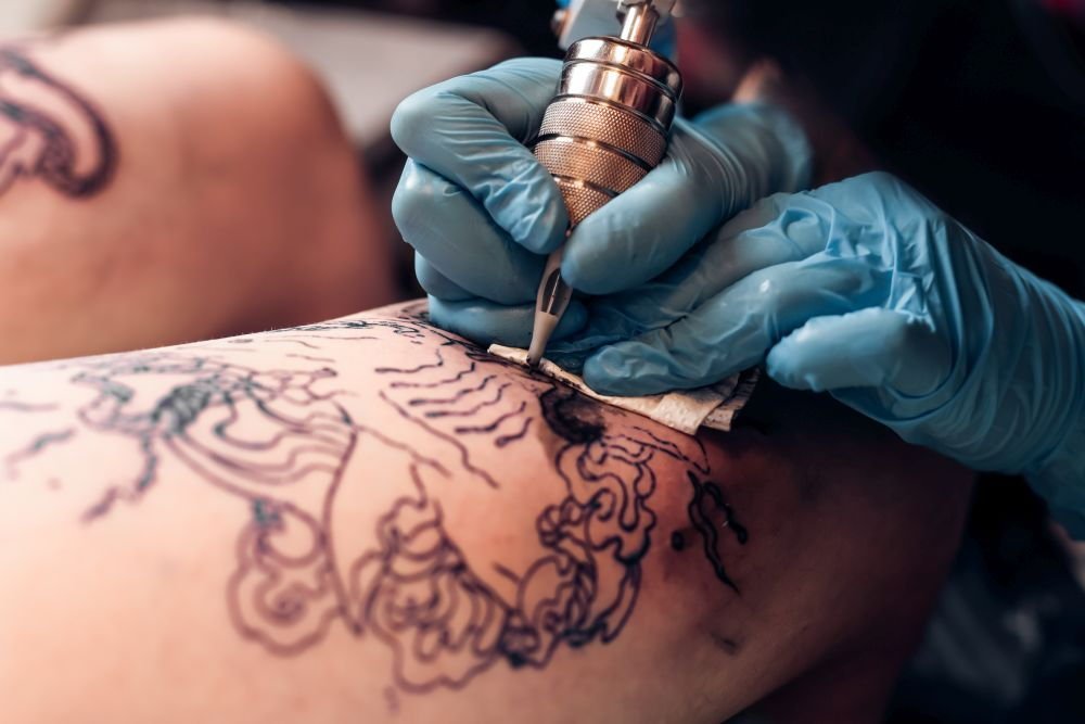© belyjmishka / stock.adobe.com Tattoo-Studio auswählen