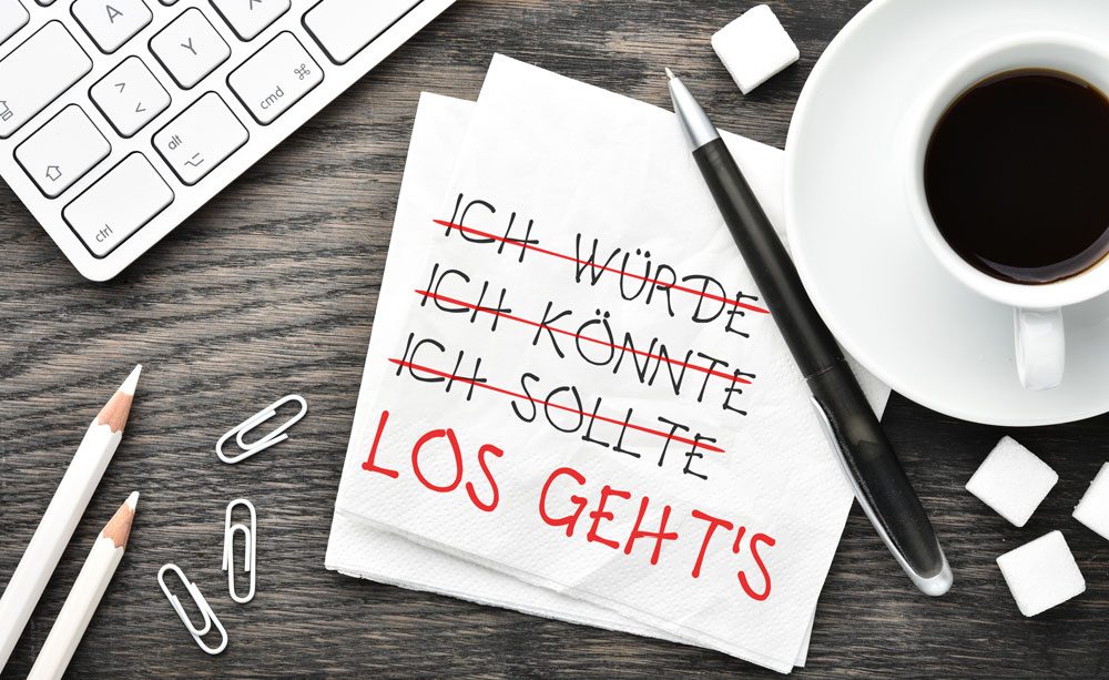 Motivation auf einer Serviette notiert Motivation